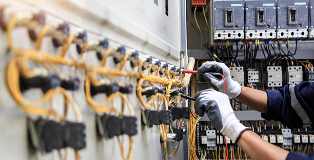 Professional Electrician technician working in Denver City, TX